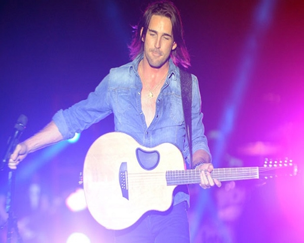 Jake Owen with a guitar